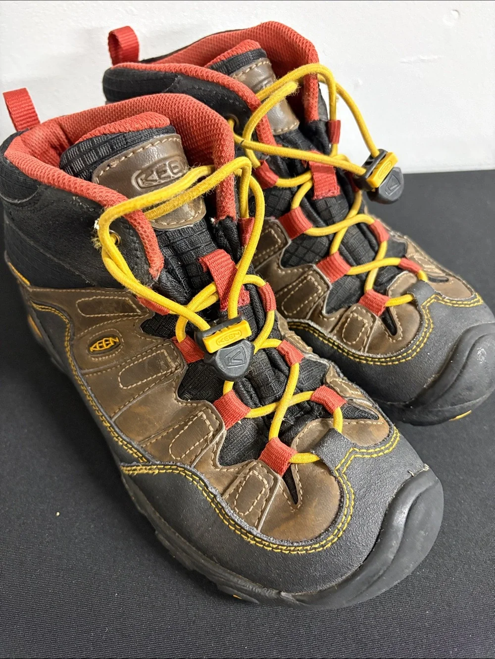 KEEN Kids Brown Hiking Boots with Yellow Laces and Red Trim